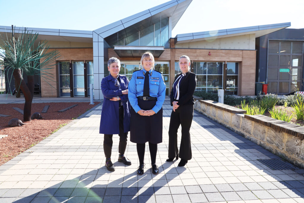 Commissioner for Victims of Crime Kati Kraszlan, Bandyup Women’s Prison Superintendent Andrea Bowen and Gosnells Community Legal Centre Chief Executive Sarah Patterson standing in front of Bandyup Women's Prison.